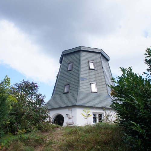 Neueindeckung einer Mühle mit Blech